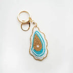 Handed Beaded keychains backed by faux leather
