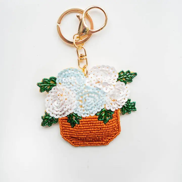 Handed Beaded keychains backed by faux leather